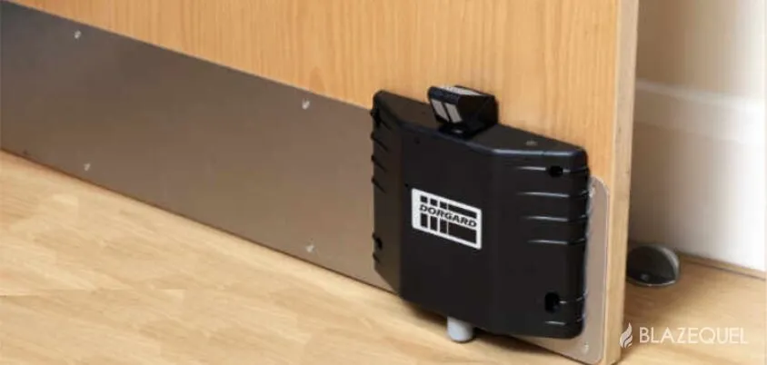 Acoustically Actuated Door Retainer